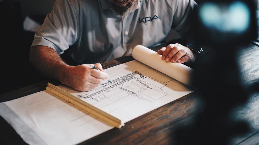 an architect working on a home plan